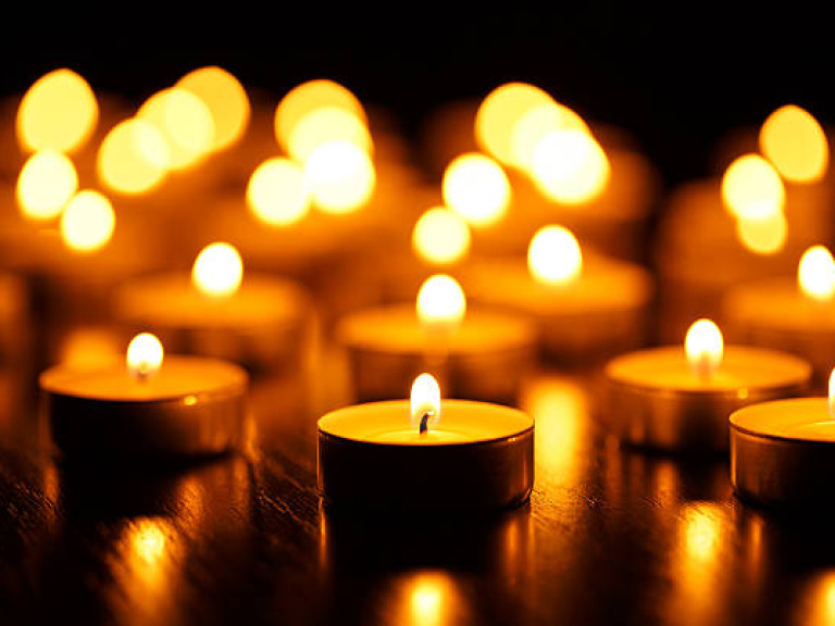 Many burning candles with shallow depth of field